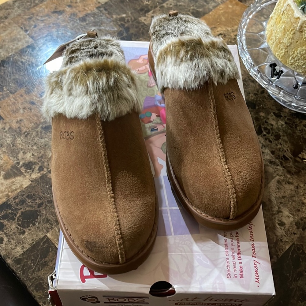 Bobs by sketcher’s, very comfortable memory foam. Size 9